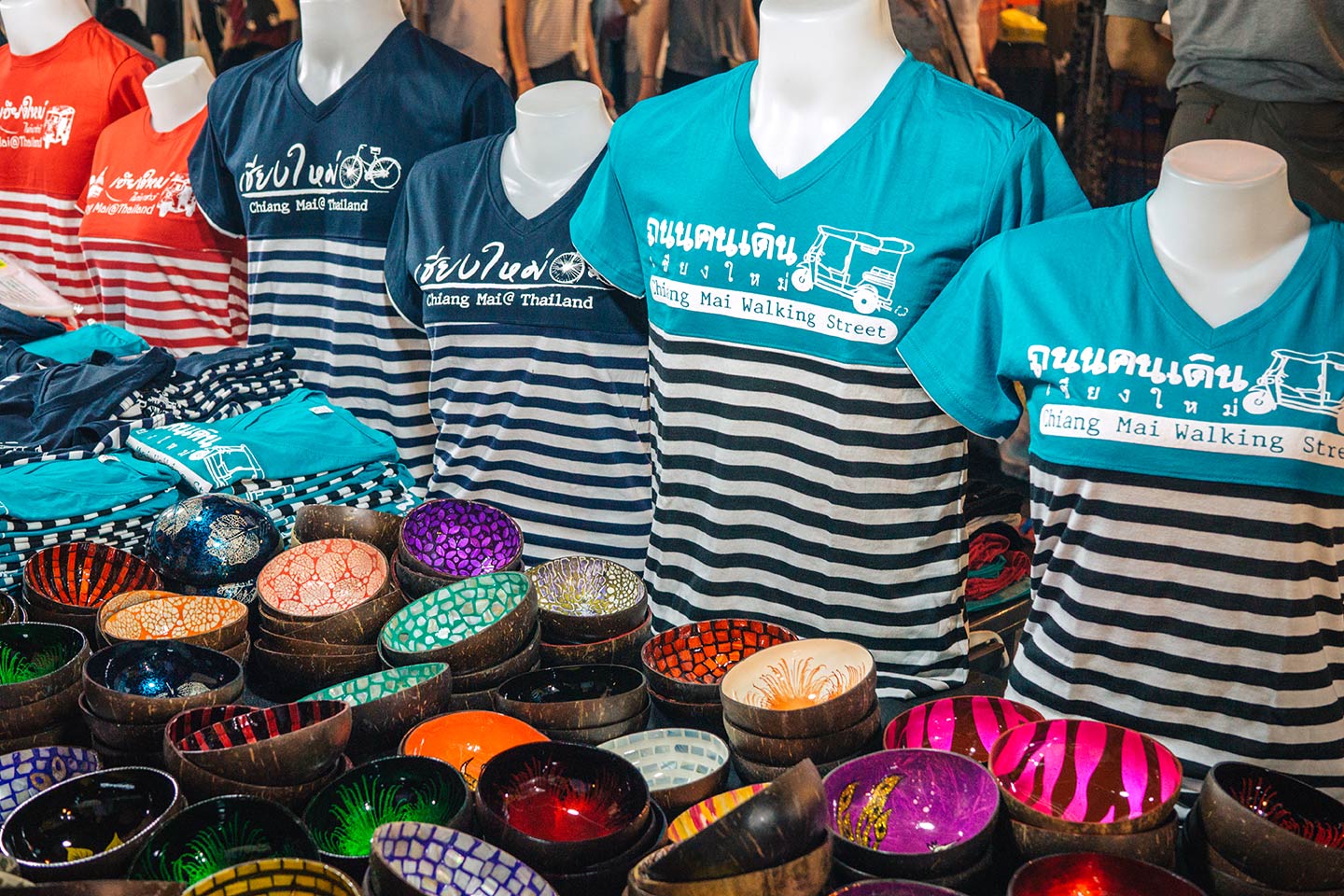 souvenirs at Sunday Walking night market in Chiang Mai  t shirts and coconut bowls